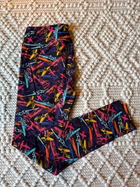 LuLaRoe Black Leggings with Neon Airplane Print